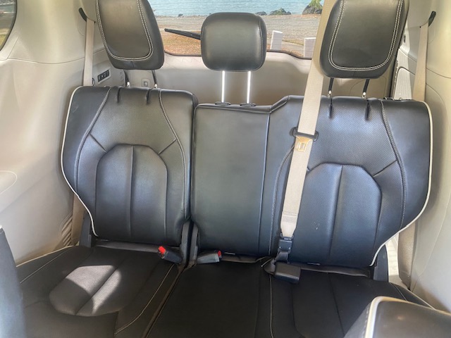 Rear leather seats inside the taxi minivan